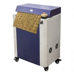 Industrial cardboard shredding machine creating eco-friendly void fill packaging.